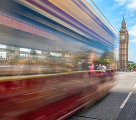 Fototapeta na wymiar London. Blurred moving people along Westminster Bridge on a sunn