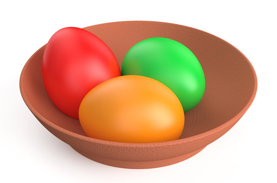 colored Easter eggs on clay plate