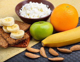 Healthy eating. Fresh fruit, cheese and almonds