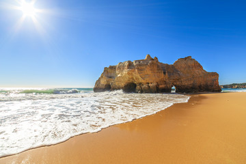 Fototapeta na wymiar A view of a Praia da Rocha in Portimao, Portugal