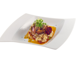 fried rabbit with spicy red sauce, risotto & chorizo