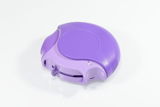 Asthma inhaler isolated on a white background