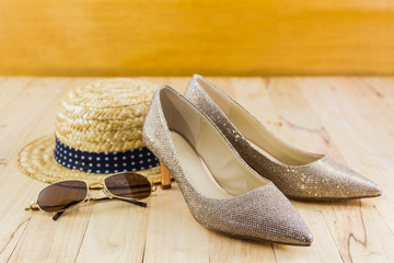 Modern style image of female fashion: straw hat, sun glasses and