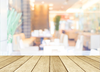 Perspective wood and blurred cafe with bokeh light background