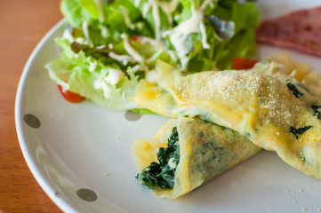 Crepe stuffed with spinach