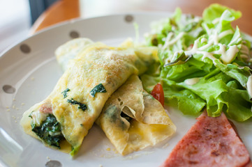 Crepe stuffed with spinach