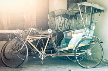 Fototapeta na wymiar Old three-wheeler,Thailand tricycle in vintage style