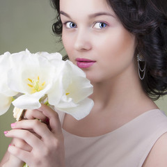 beautiful young woman with flowers