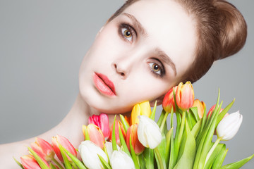 beautiful young woman with flowers