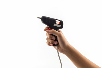 Electric hot glue gun .