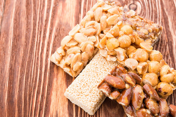 Peanut brittle sweet hard on wooden table