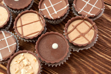 Dark chocolate on wooden background