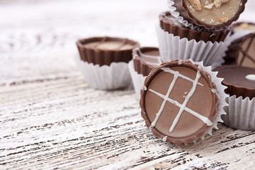 Dark chocolate on wooden background