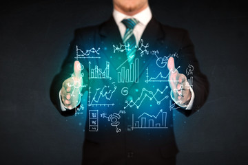 holding hand drawn business diagrams