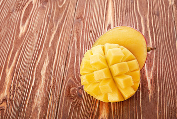 Mango fruit on wood