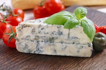 Mediterranean cuisine: blue cheese, baguette, tomatoes