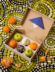 Set of cupcakes, apples and tangerines