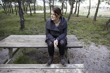 Fototapeta premium Young woman in the field