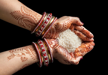Indian hands with rice