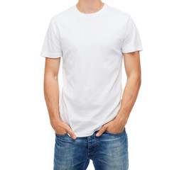 smiling young man in blank white t-shirt