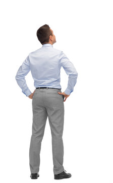 Businessman Looking Up From Back