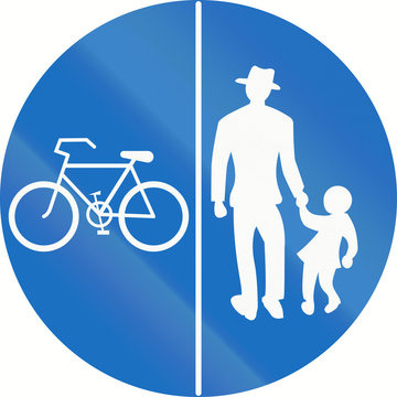 Austrian traffic sign on a shared-use path with separate lanes, left lane for bicycles and right lane for pedestrians