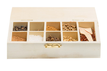 wooden box with spices different