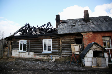 Fototapeta na wymiar conflagration. Elements of the burned house