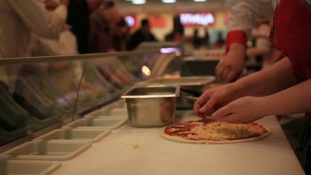 Process of preparing pizza in grocery store. HD. 1920x1080