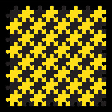 yellow jigsaw puzzle pieces on black background