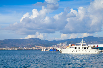 Coastal cityscape with moored ships. Izmir,Turkey