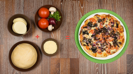 Pizza on the green napkin and the ingredients of which it is mad