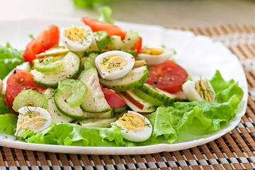 Salad of tomatoes, cucumbers and quail eggs