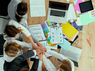 Fototapeta na wymiar Business team with hands together - teamwork concepts