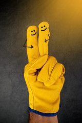Happy Laughing Smileys on Fingers of Protective Gloves