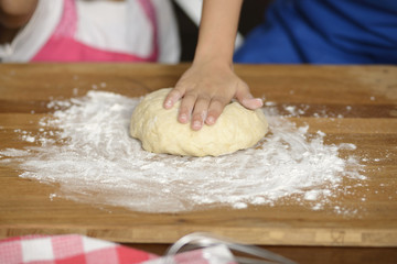 Little Girl Making Dough