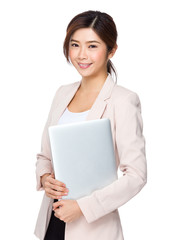 Young businesswoman with laptop