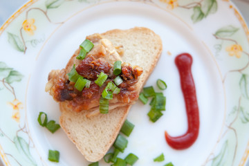 grilled meat and onions skhlekbom on a plate