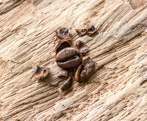Coffee beans on wood background