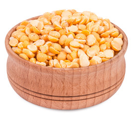 Yellow peas in a wooden bowl isolated on white background