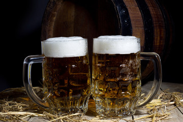 Still Life with Beer Mugs and Barrel on Black Background