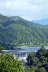 Obraz na płótnie Canvas Автомобильный мост через реку Шахе на фоне гор (Сочи)