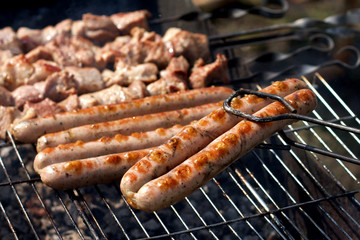 Sausages on grill in summer