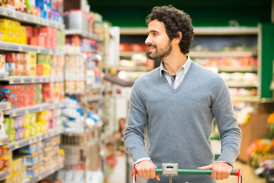 Man shopping in a supermarket