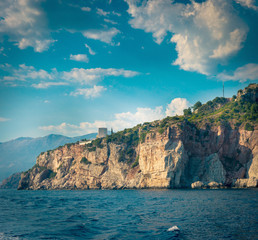 The high cliffs next to the central beach of Budva