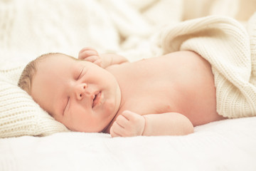 Obraz na płótnie Canvas Sleeping infant boy