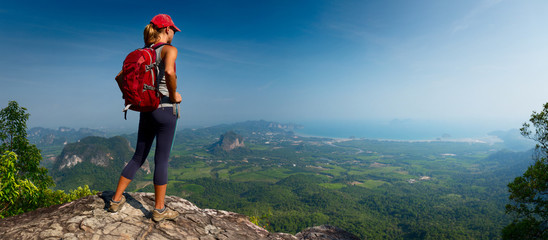 Lady hiker on the mountain - Powered by Adobe