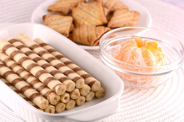 sweet cake on white plate with lemon