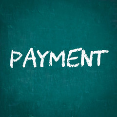 PAYMENT written on chalkboard