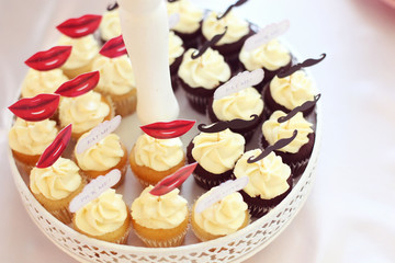 Delicious muffins with Eat Me text